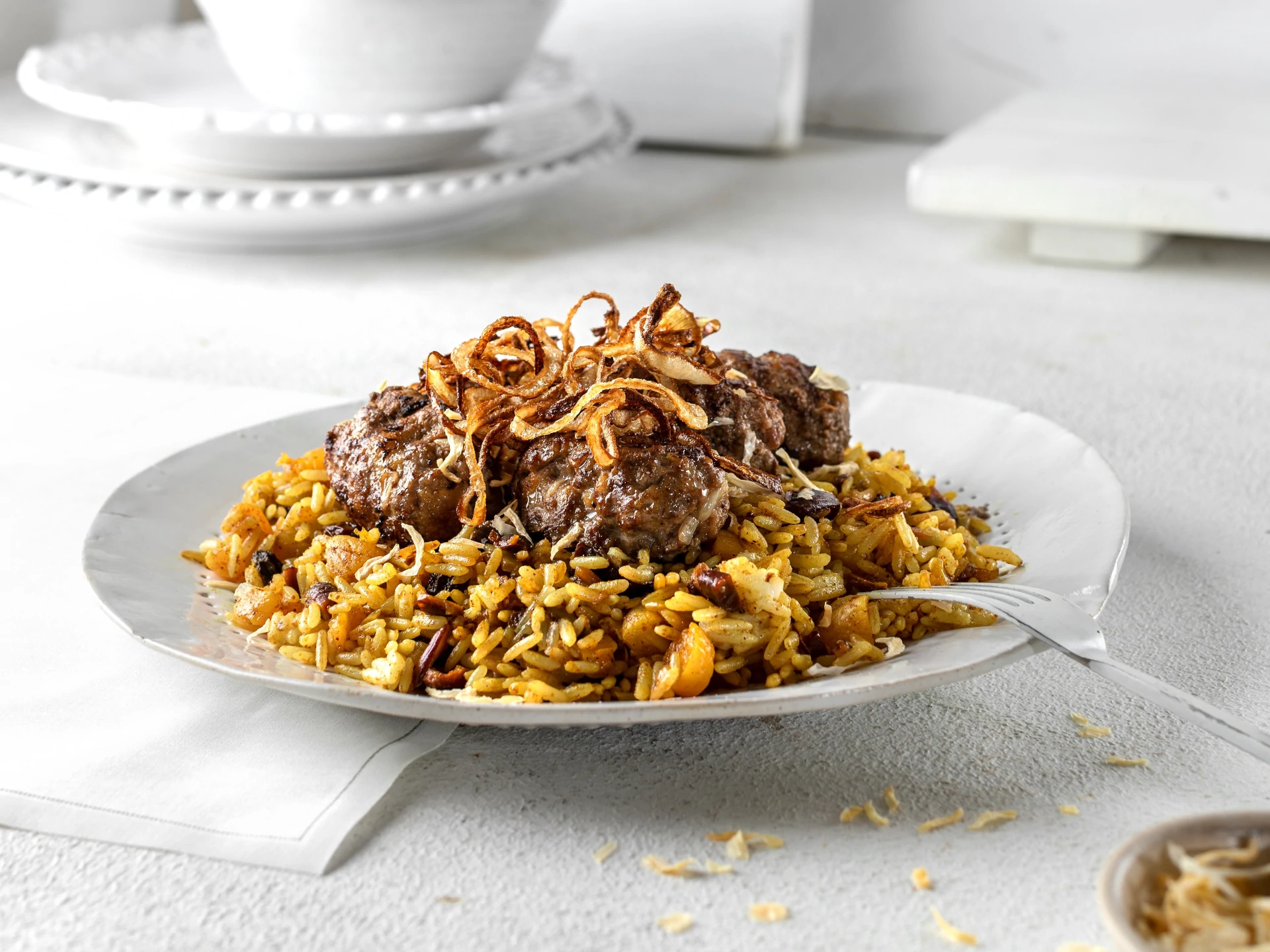 Spiced Kebabs with Jeweled Rice and Crispy Onions