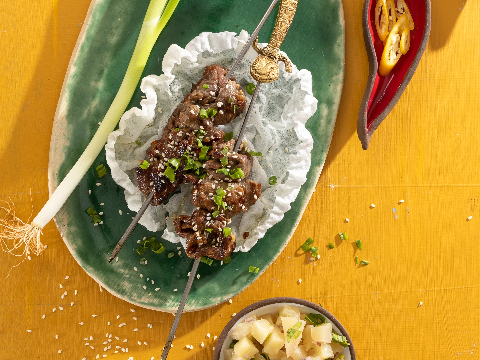 Teri Beef Sticks and Pineapple Salsa on Puffed Rice Plates