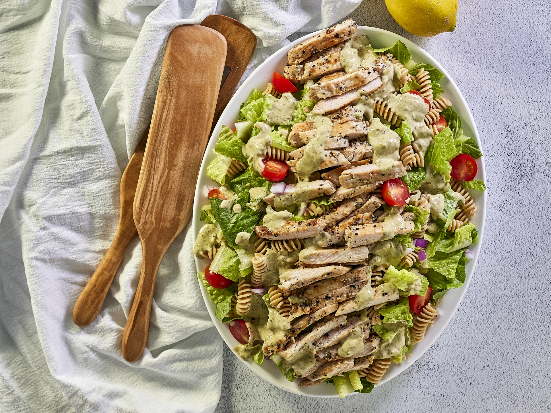 Flavor Bomb Pesto Chicken & Pasta Caesar Salad