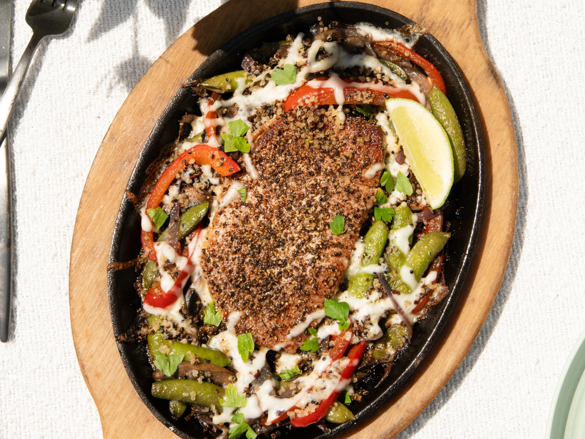 Pepper-Crusted Tuna Steak with Quinoa Stir-Fry