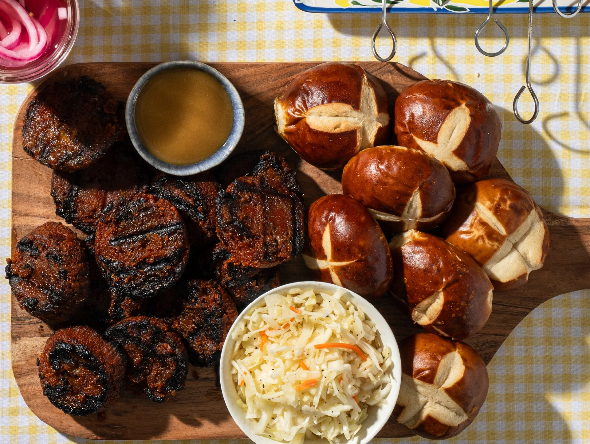 Pastrami-Kishka Sliders with Tangy Slaw
