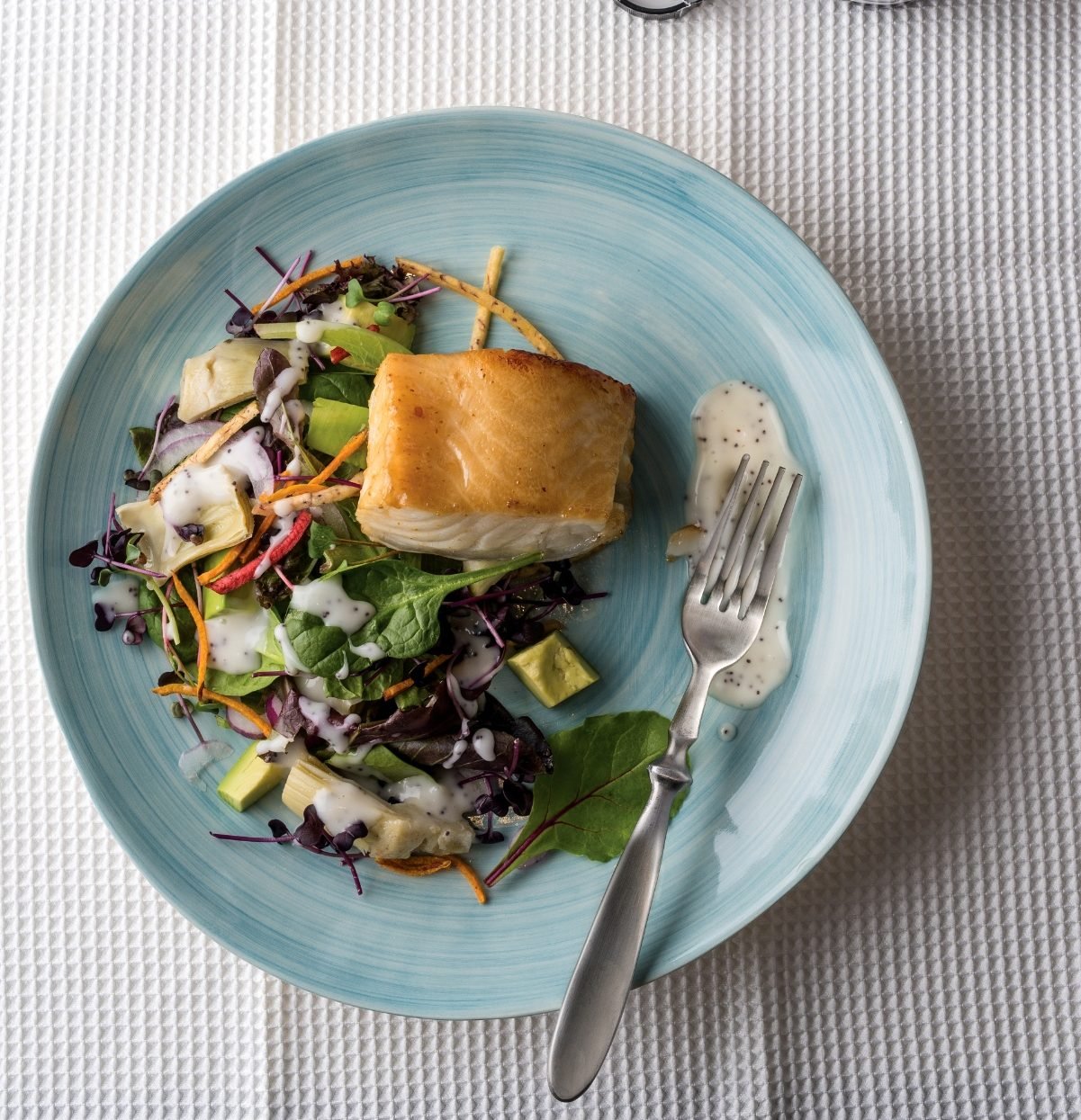 Marinated Sea Bass over Artichoke Salad