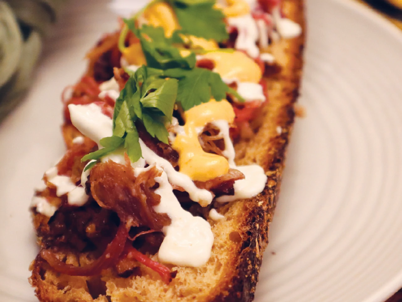 Candied Double-Smoked Beef Belly on Sourdough Crostini