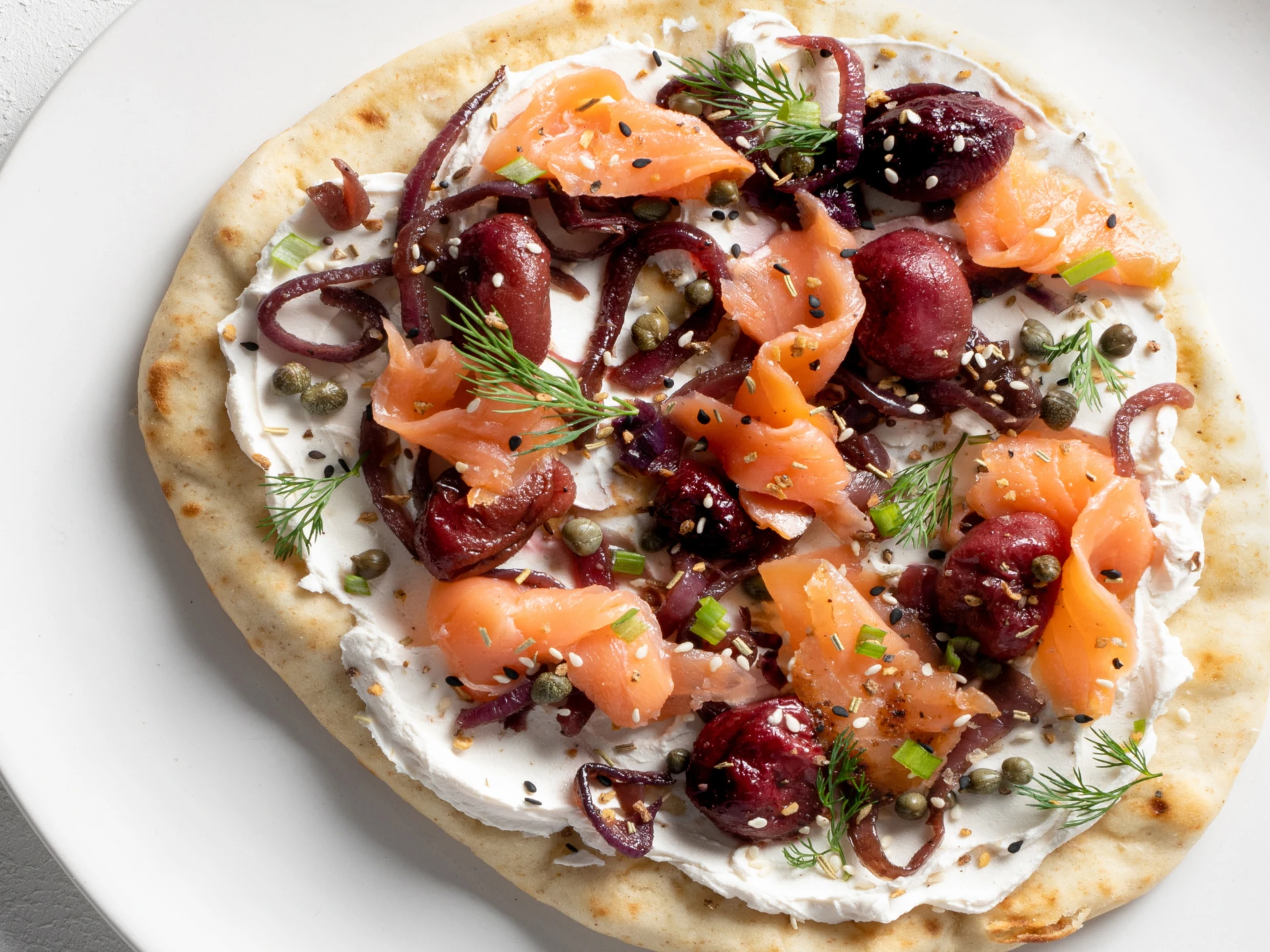Smoked Salmon Flatbread with Balsamic Grapes and Onions
