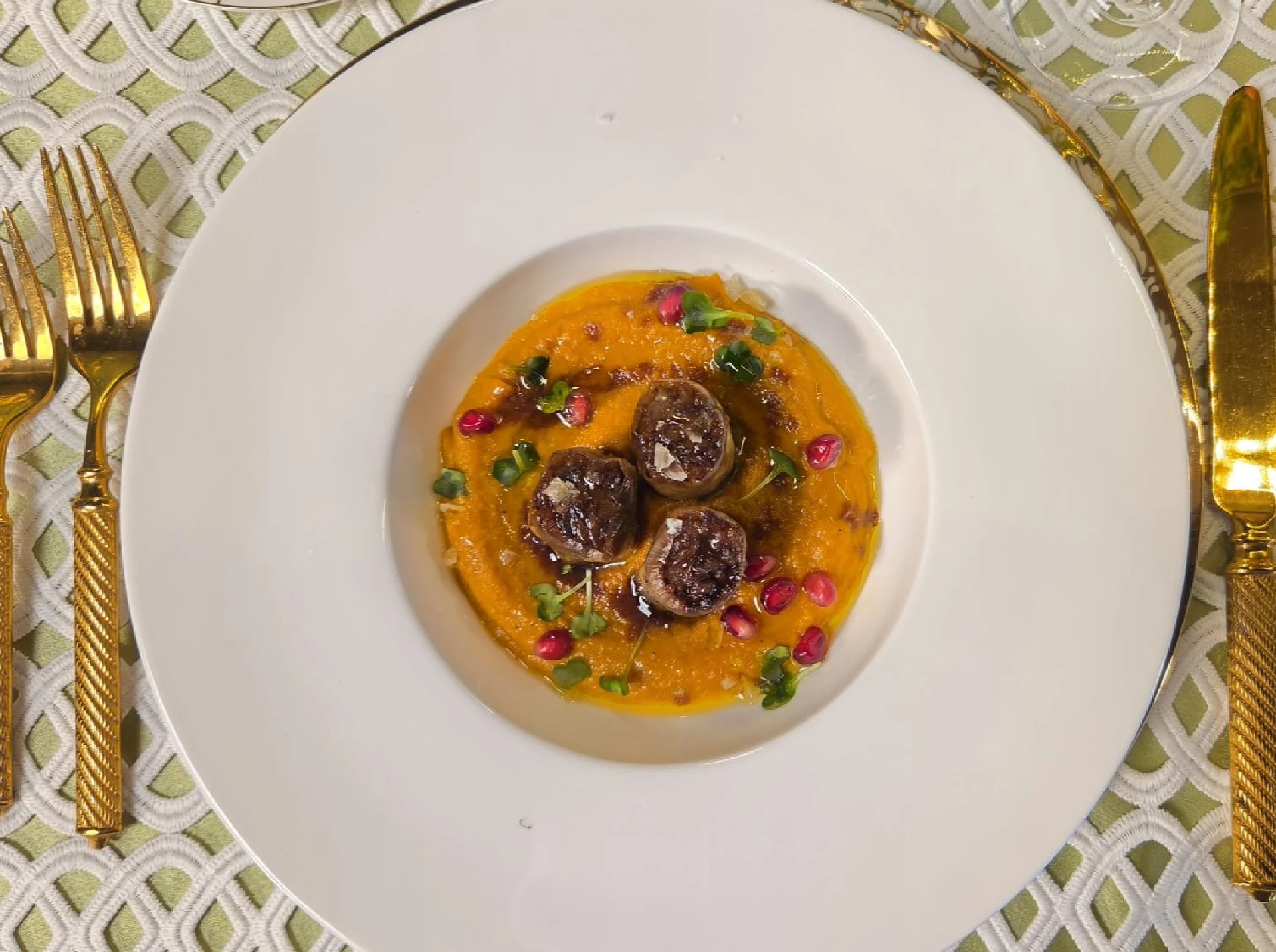 Honey-Pomegranate Glazed Stuffed Leeks over Roasted Carrot, Butternut, and Golden Beet Puree