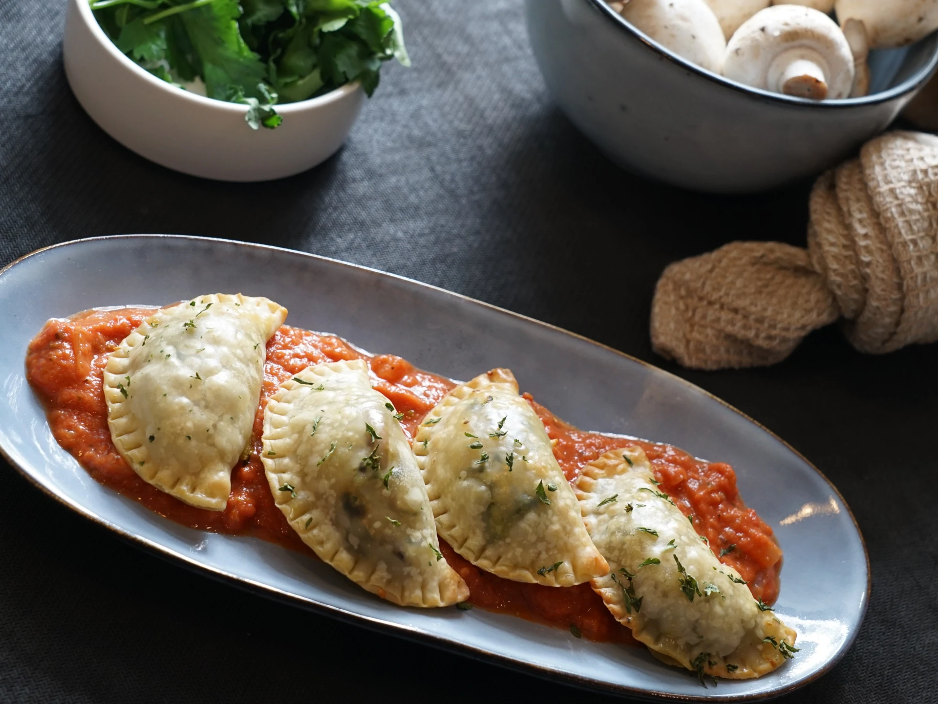 Mini Mushroom Spinach Calzones with Red Cream Sauce