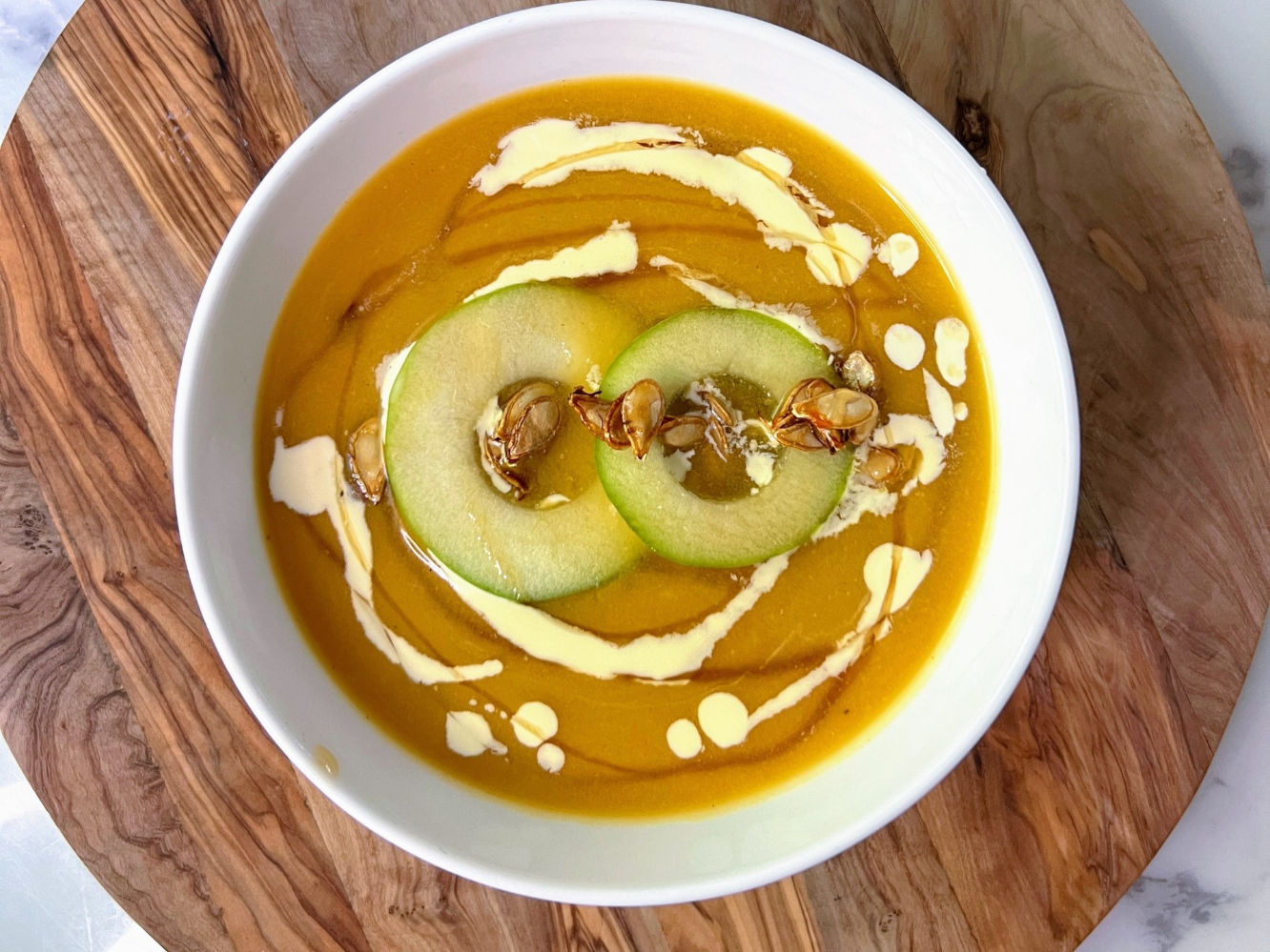 Roasted Butternut Squash and Apple Soup with Honey Roasted Pumpkin Seeds