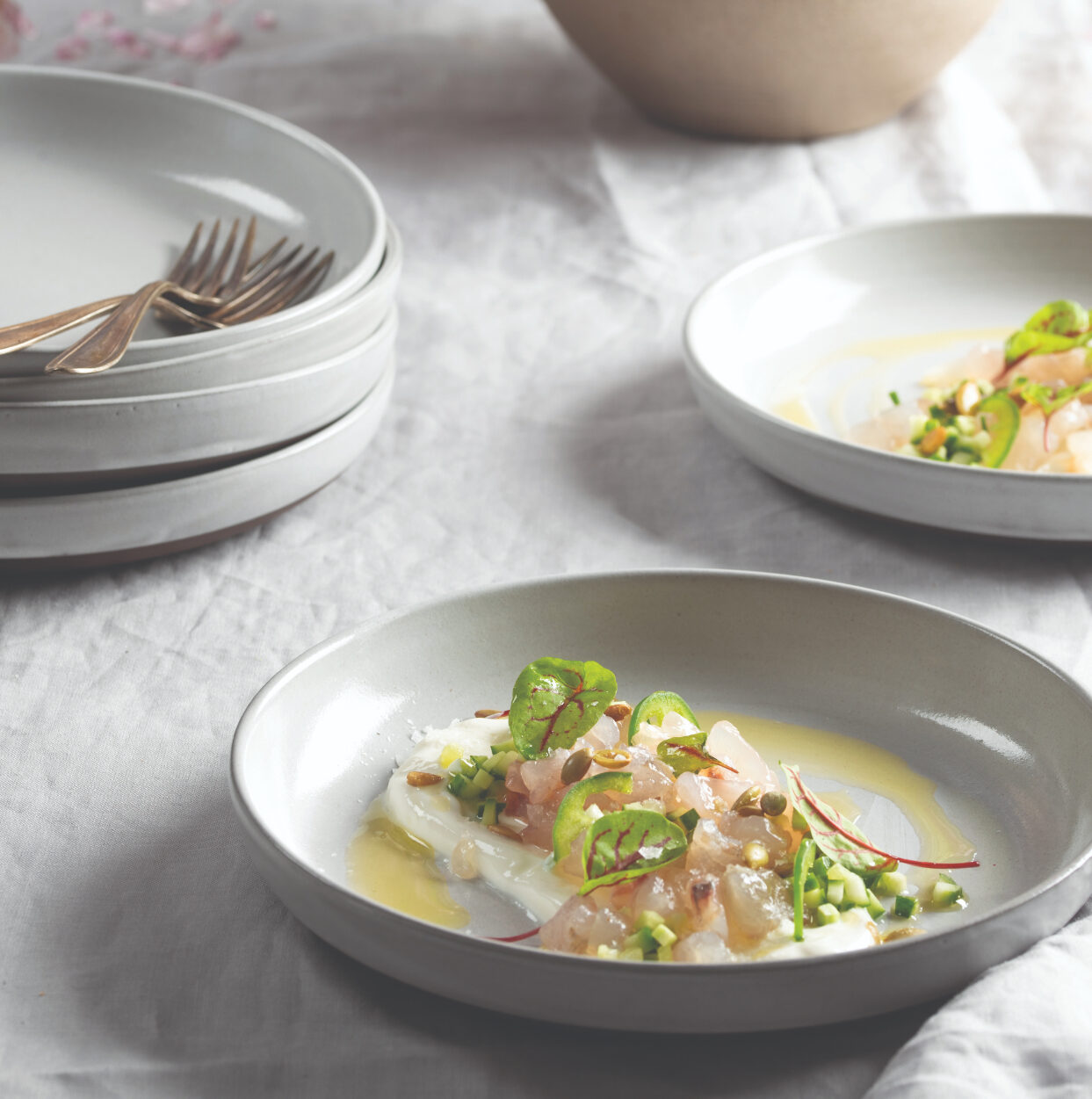 Cured Fluke Tartare With Serrano, Roasted Cashews And Yogurt Sauce